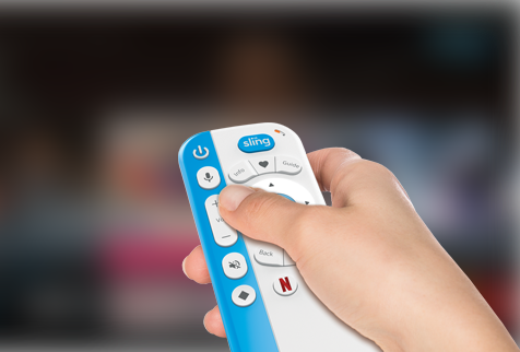 Hand using AirTV Player remote